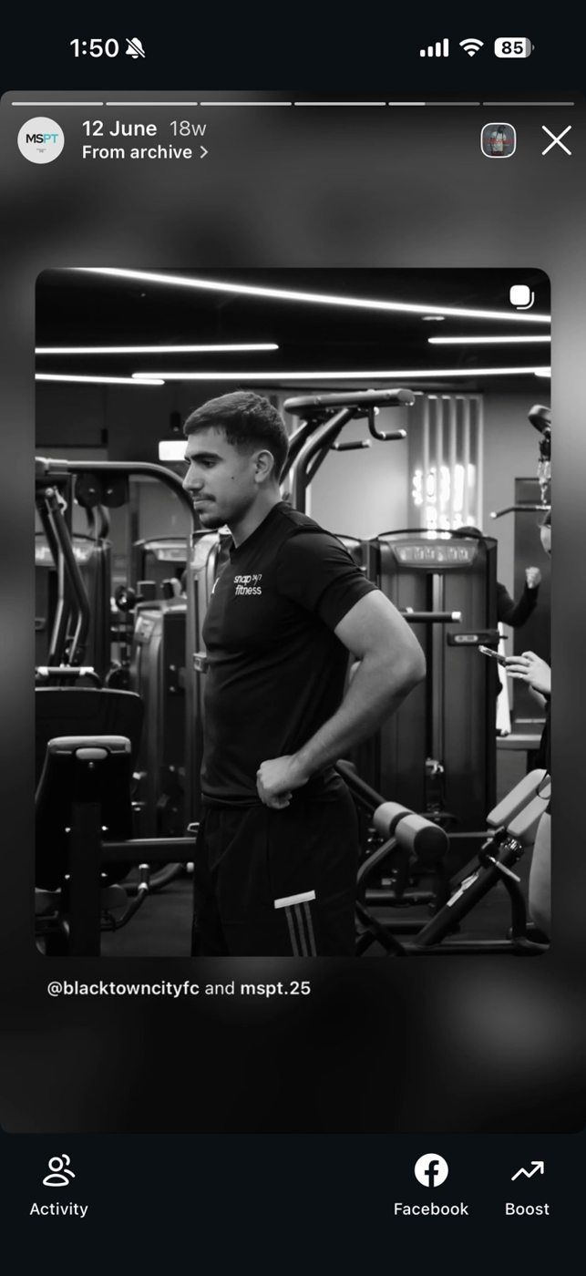 Michel coaching in a gym setting